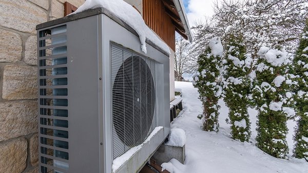 Cold-climate heat pump in winter snow